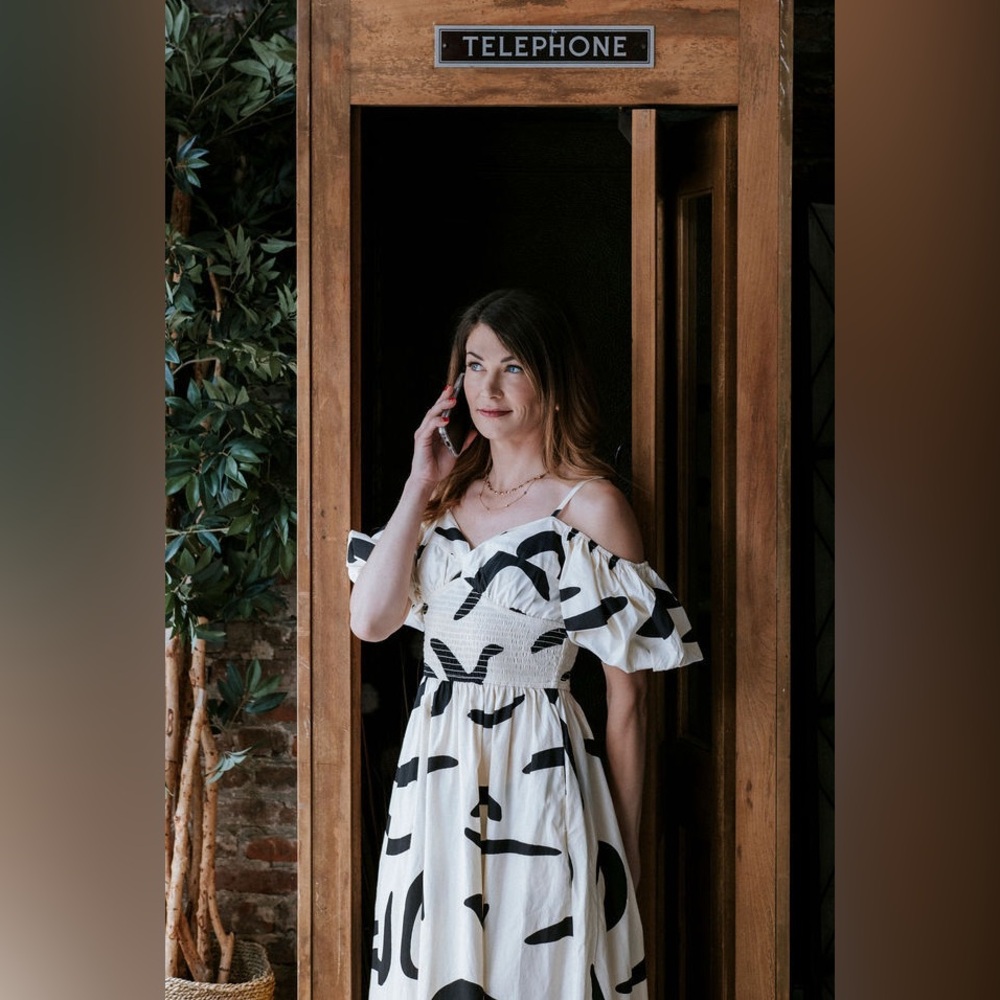 Cold-Shoulder Smocked Midi Dress in White with Black Print